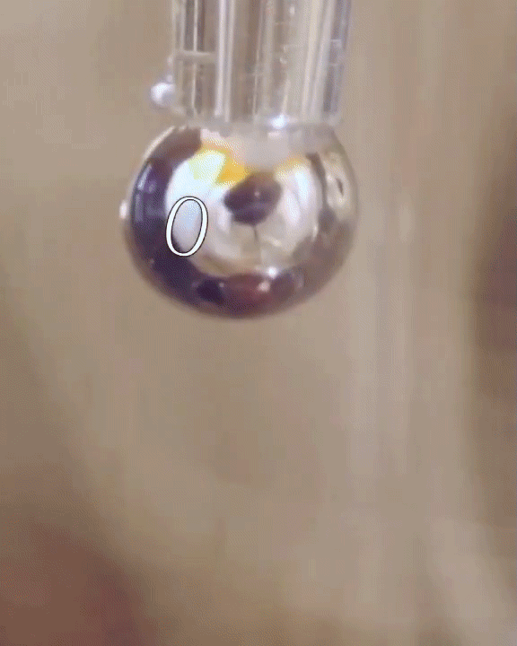 Metallic water solution on a NaK droplet - enlarged view