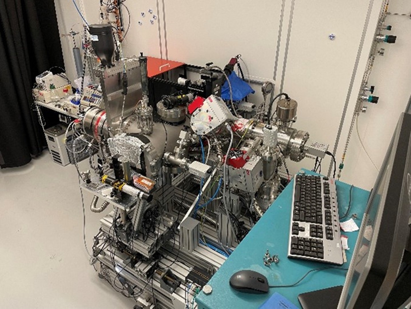 A differentially-pumped, angle-resolved time-of-flight photoemission spectrometer