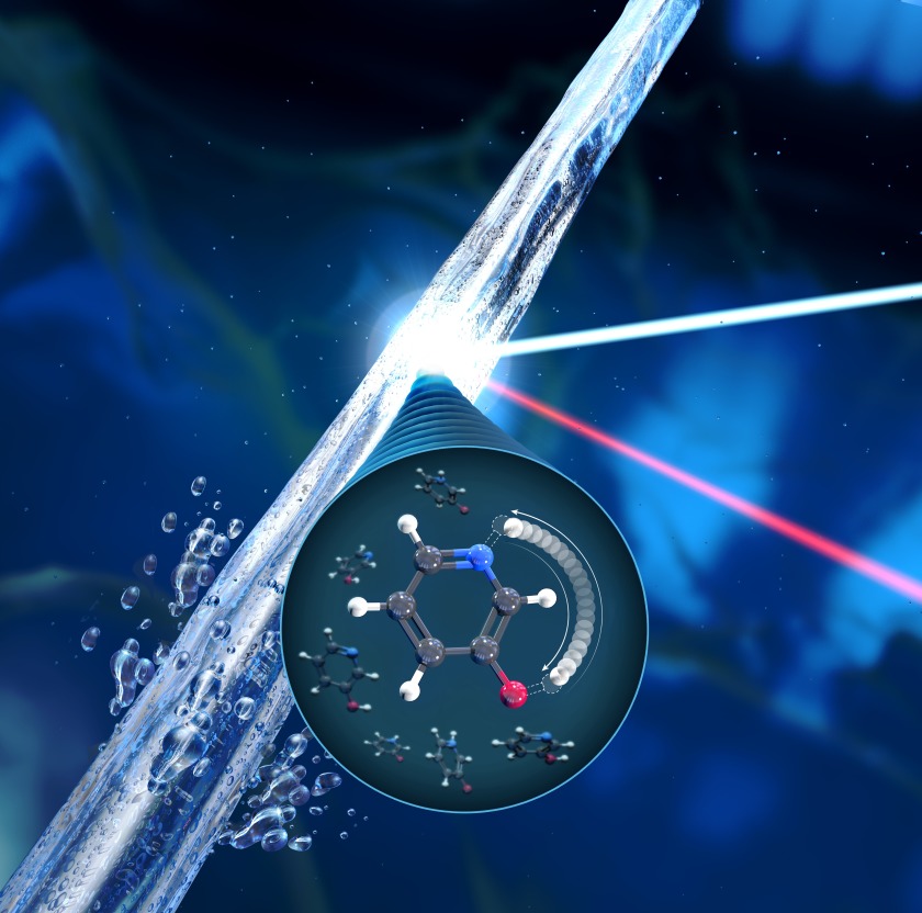 The illustration visualises the experimental method, here on the prototypical keto-enol equilibrium. It appears on the cover of &ldquo;The Journal of Physical Chemistry Letters&rdquo;.