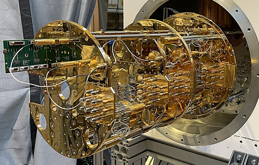The superconducting sensors need a temperature below 25 milli Kelvin. This is achieved by using a He<sup>4</sup>-He<sup>3</sup> dilution refrigerator, pictured here. It is similar to those used for quantum computers.