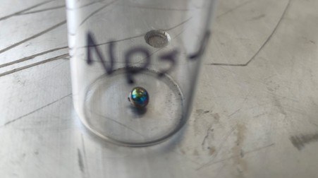 A frustrated material, and a frustrating synthesis