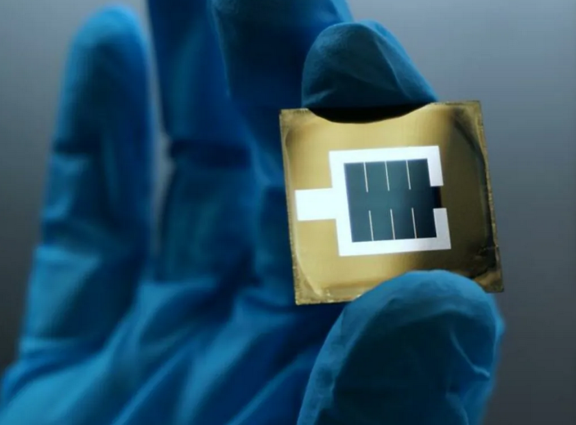 Photo of the perovskite/silicon tandem solar cell. The active area in the middle of the wafer is enclosed by the silver electrode.