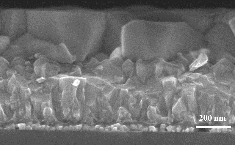 Under the scanning electron microscope, the CsPbI<sub>3</sub> layer (large blocks in the upper part of the image) on the FTO substrate looks almost exactly the same after annealing in ambient air as after annealing under controlled conditions.