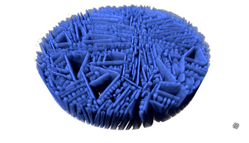 Die R&ouml;ntgentomographie zeigt hier in 3D die Struktur, die ein Modellsystem auf Basis einer Zuckerl&ouml;sung ausgebildet hat. Die Eiskristalle erscheinen in der Abbildung blau, die Zuckerl&ouml;sung ist transparent. Bemerkenswert ist, dass sich durch den Gefrierguss sowohl wandartige Strukturen als auch kugelige &bdquo;Froschfinger&ldquo; bilden.