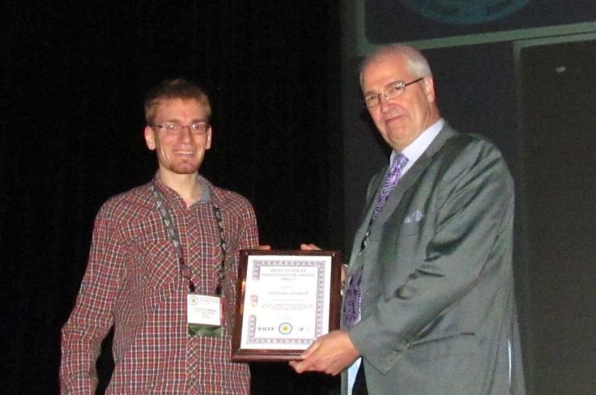 Dominic (right) receives the IEEE PVSC Award <br />from the Conference Chair B.J. Stanberry (left).