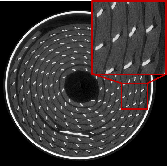 The x-ray tomography shows ruptures (black) in the regions of electrical contacts (white).